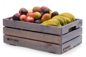 Ekologisk frukt på jobbet i fruktkorg